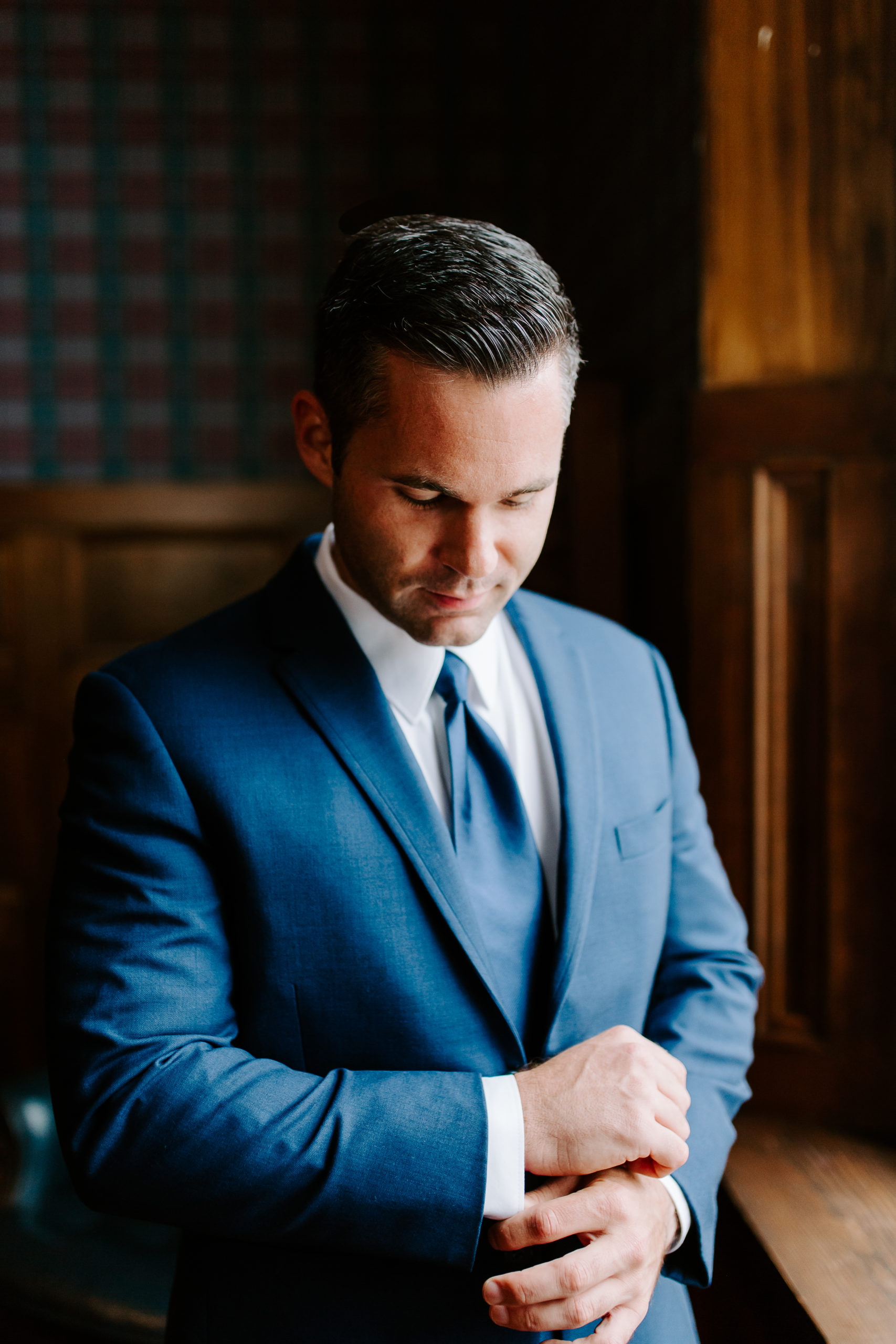 Groom getting ready photo