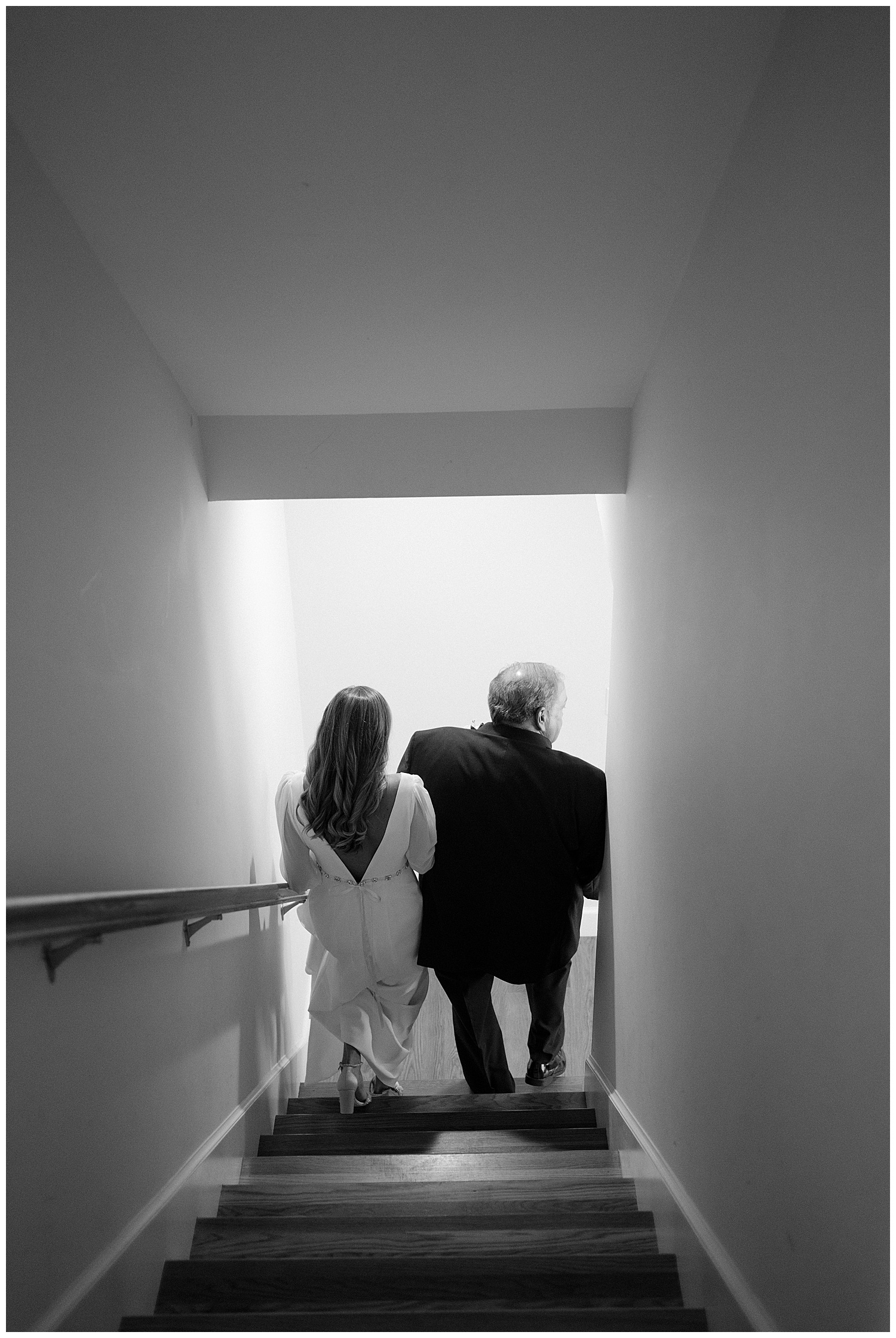 Bride and Father walking downstairs to head to Newport Church for wedding ceremony