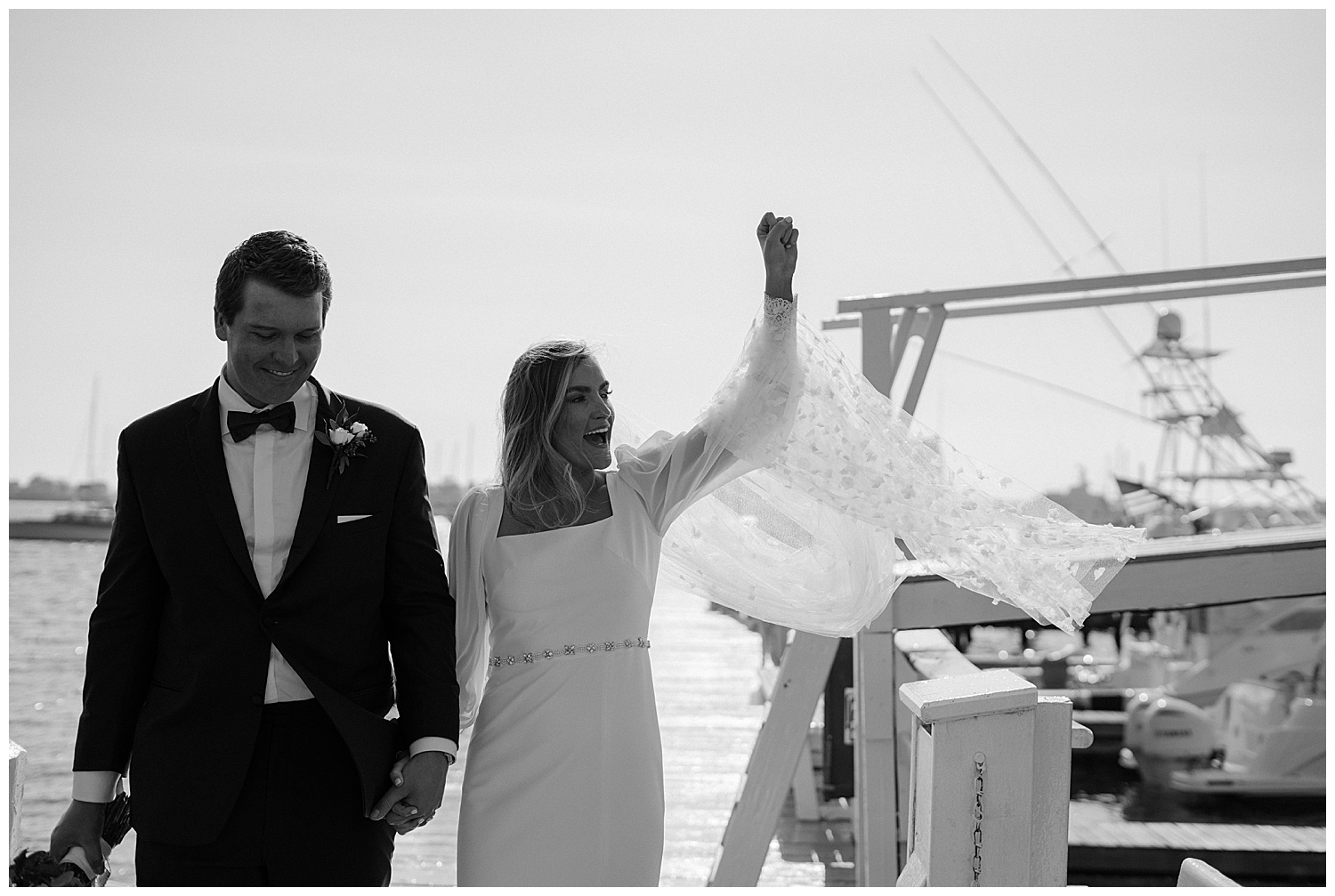 Chic Downtown Newport Wedding Photos of Bride and Groom on Bowens Wharf