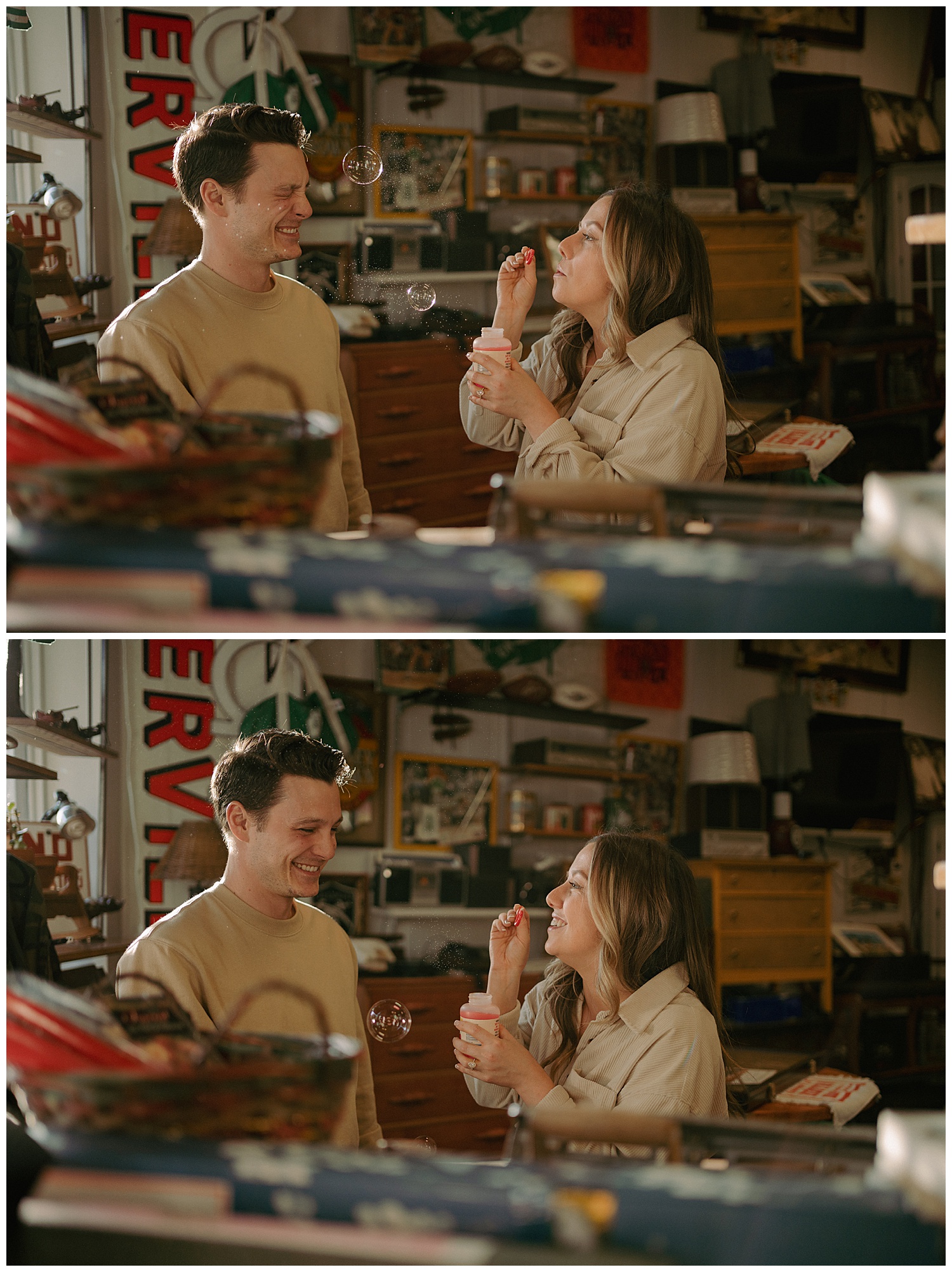 The couple blowing bubbles at each other in the antique store window light