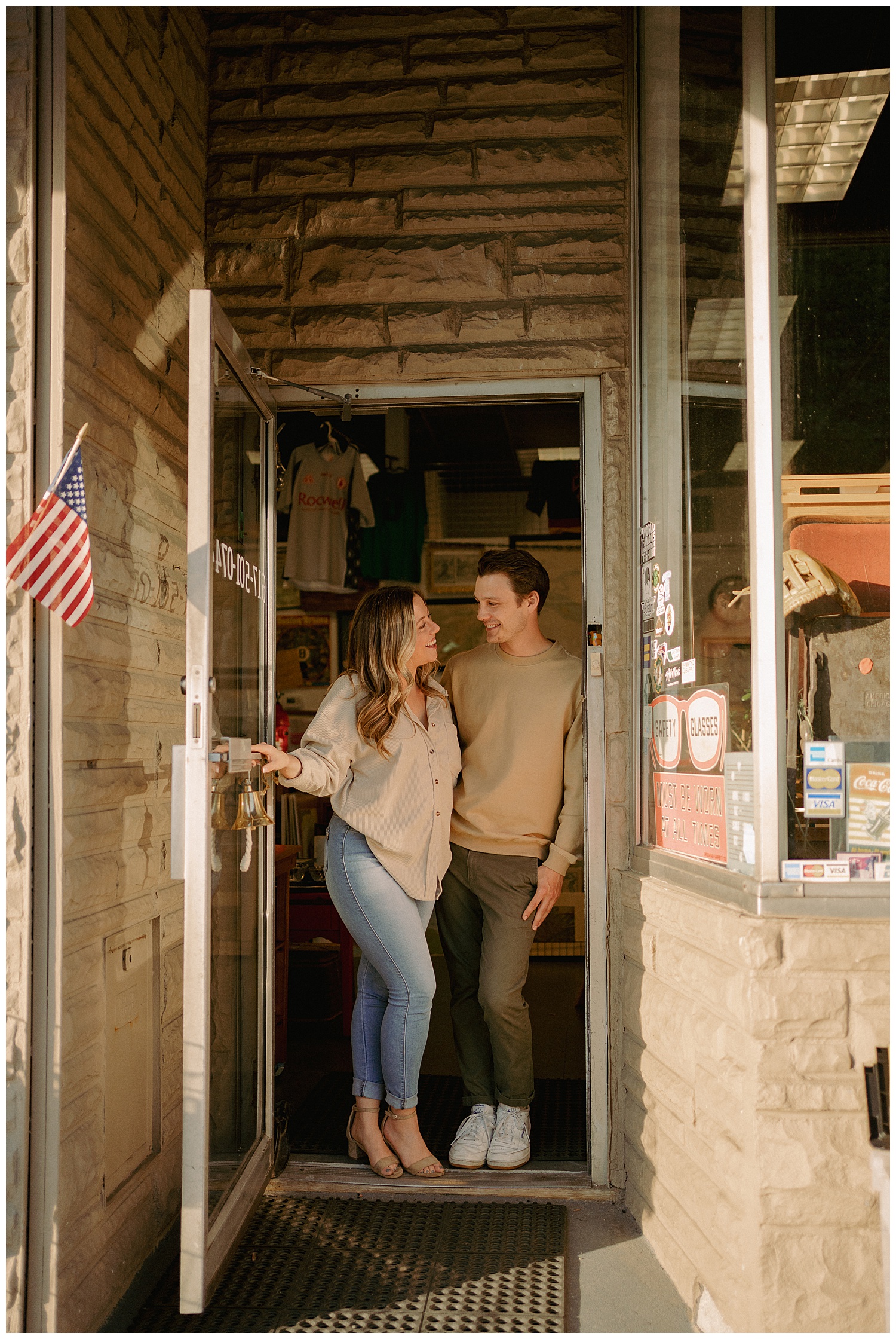 Couple standing in antique store entrance